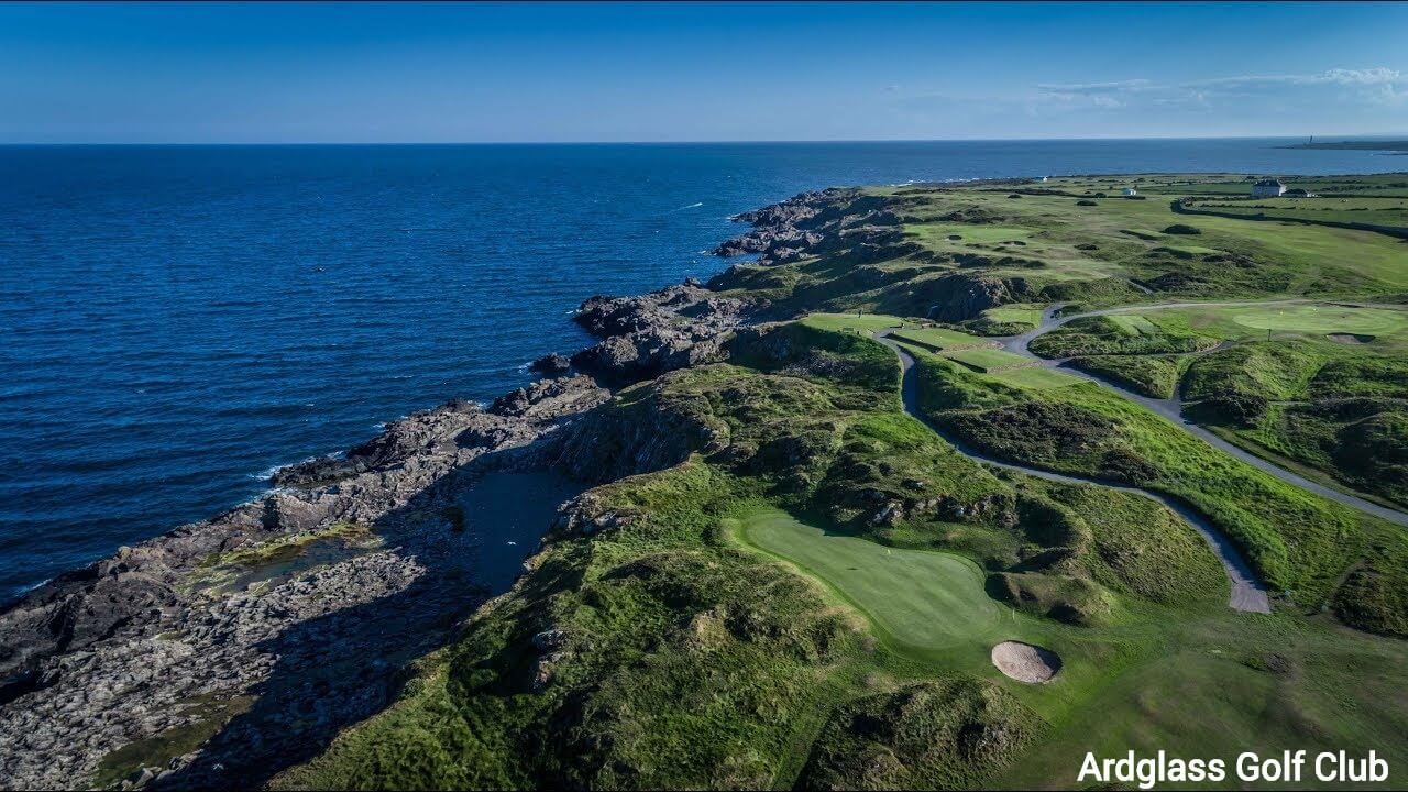 Aerial view of the Ardlgass golf club bordering the ocean