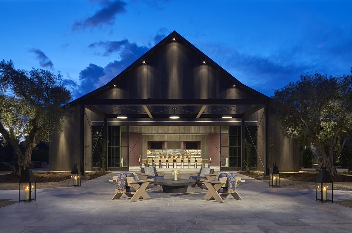Twilight exterior view of the new Farmhouse building at Ojai Valley Inn