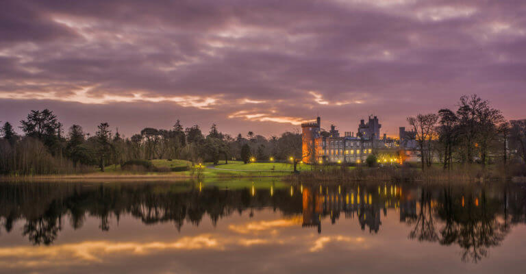 Exterior view of the Dromoland Castle Hotel at night