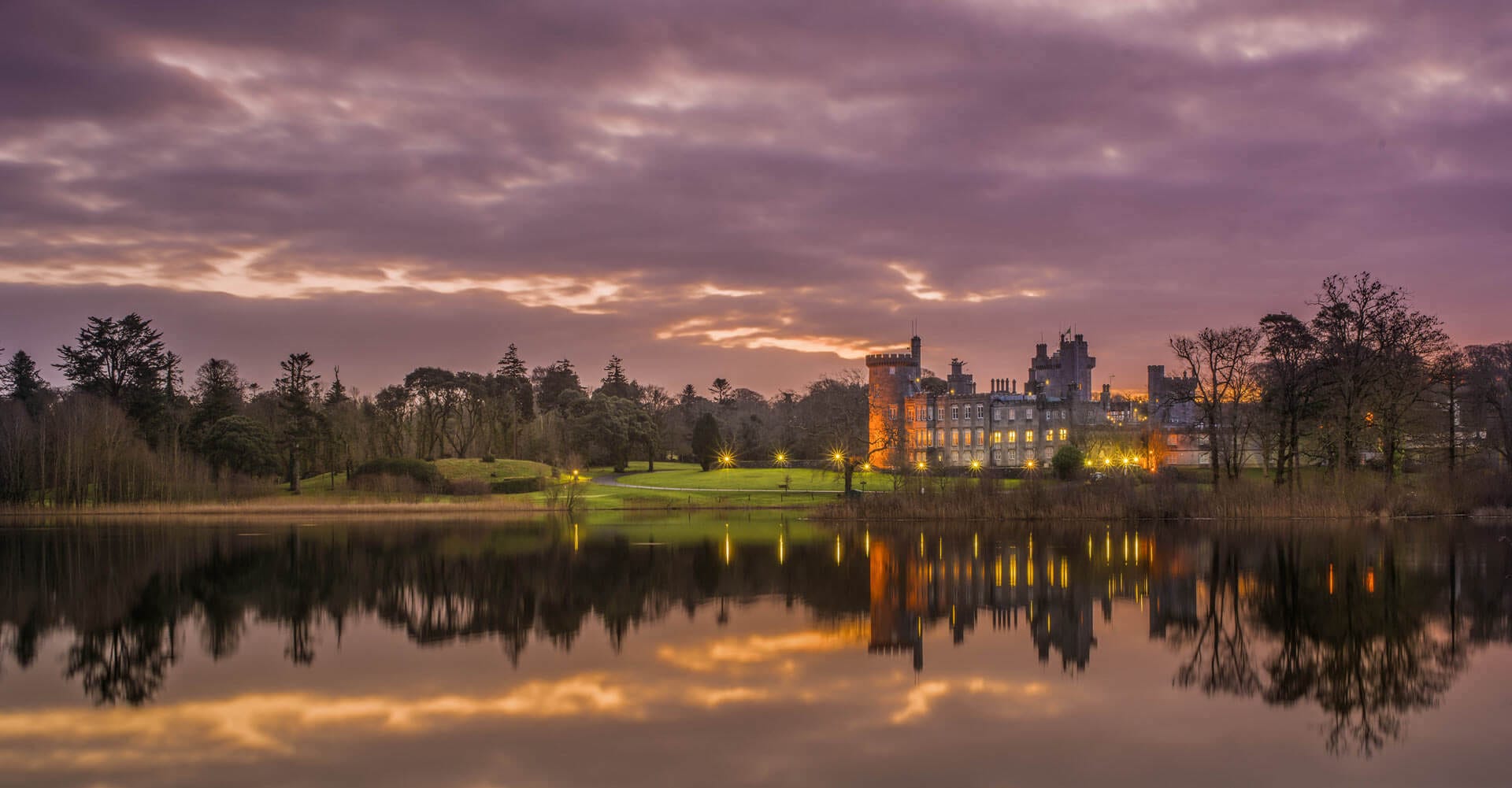 Exterior view of the Dromoland Castle Hotel at night
