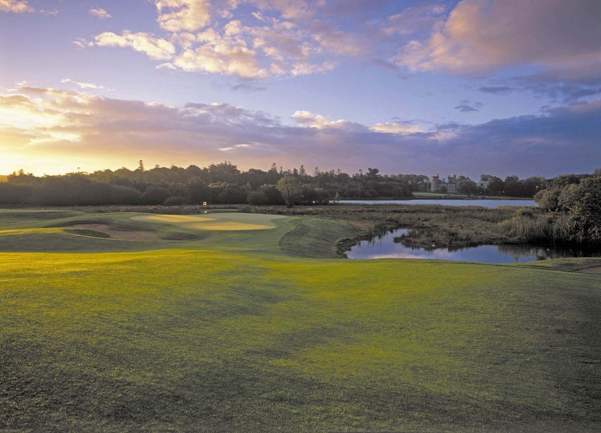 Ninth green features Castle views at Dromoland