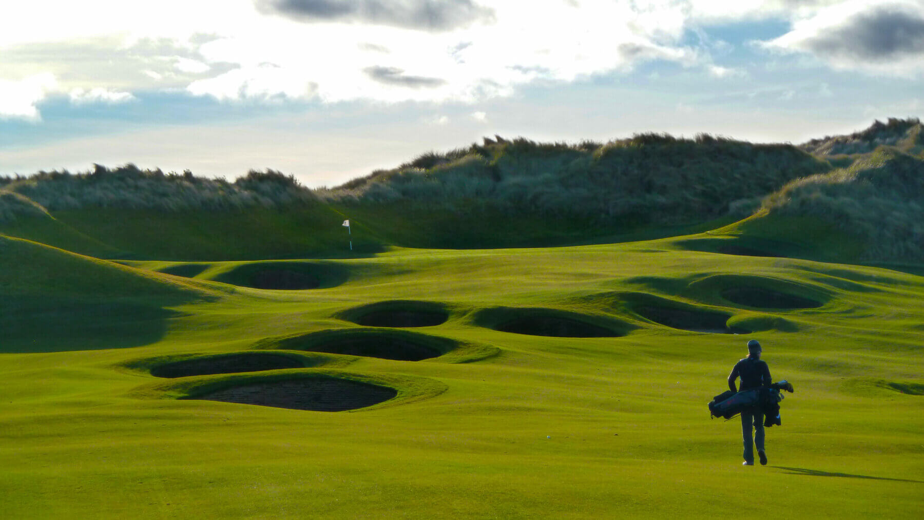 Deep pot bunkers litter the fourth fairway at Trump International Golf Links