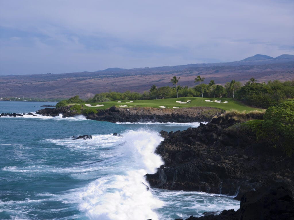 Crashing surf features on the iconic par-3 third hole at Mauna Kea golf course