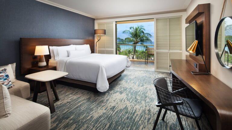 A large king bed adorns the Ocean-view bedrooms at Westin Hapuna Beach Resort