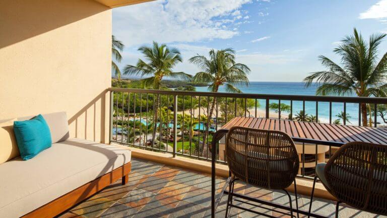 Private balcony on the top floor overlooks the beach and resort pools