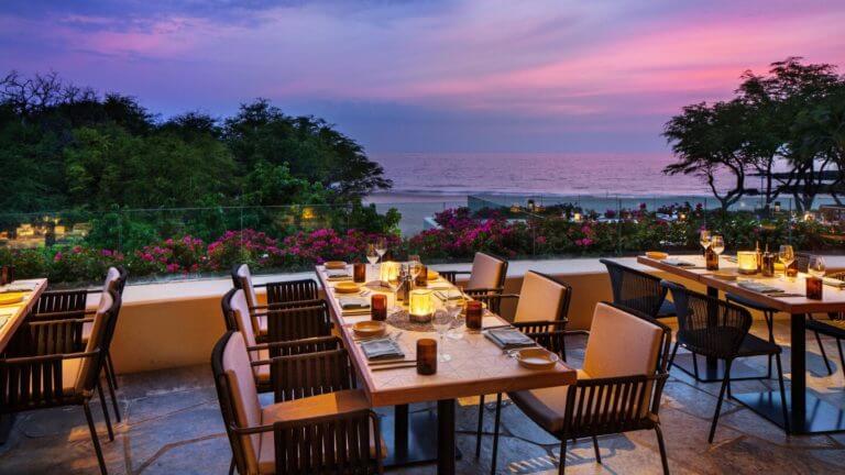 Purple sky shines over Meridia Restaurant terrace dining at Westin Hapuna Beach Resort