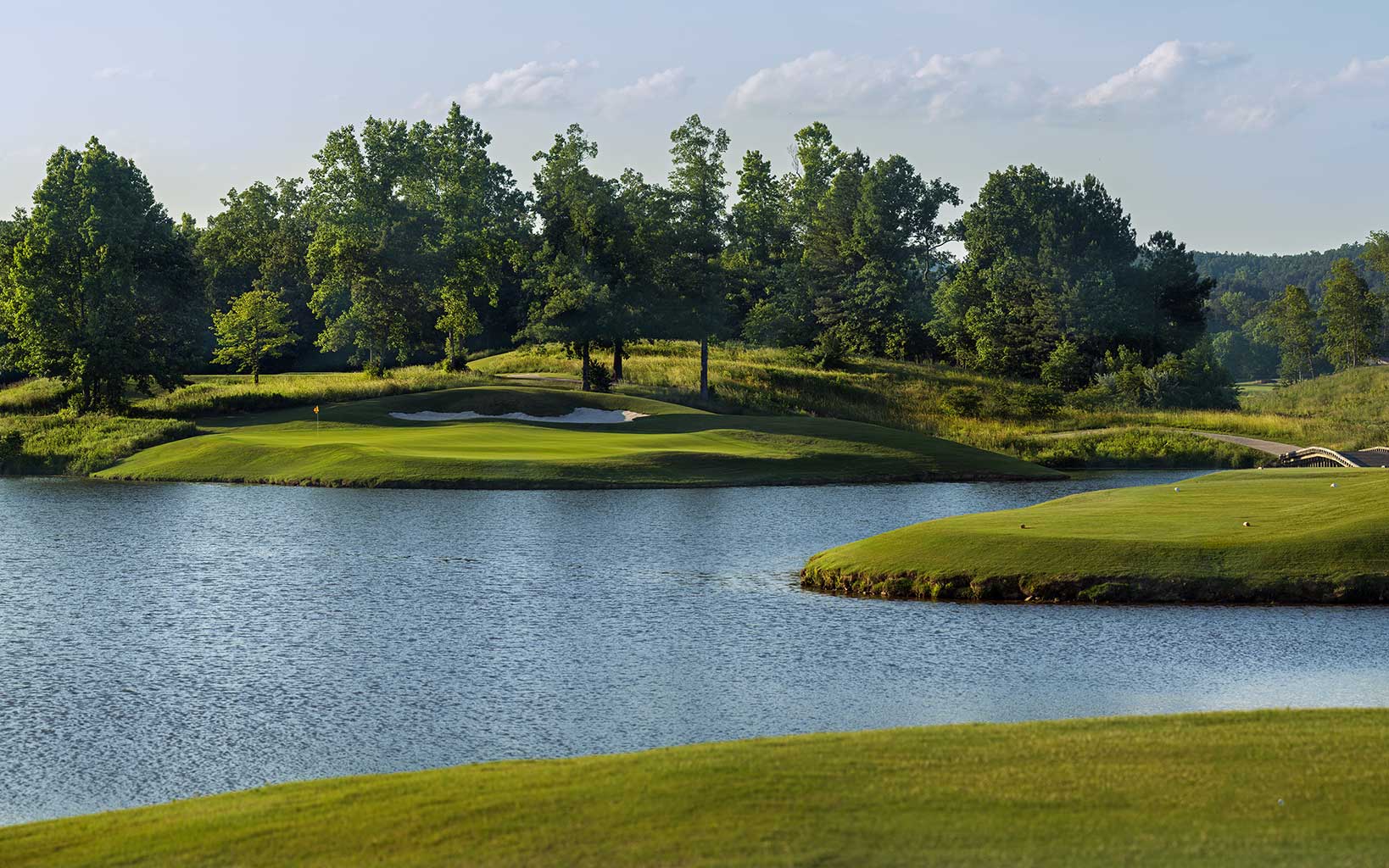 A large lake features on the first hole of the Short course at Silver Lakes