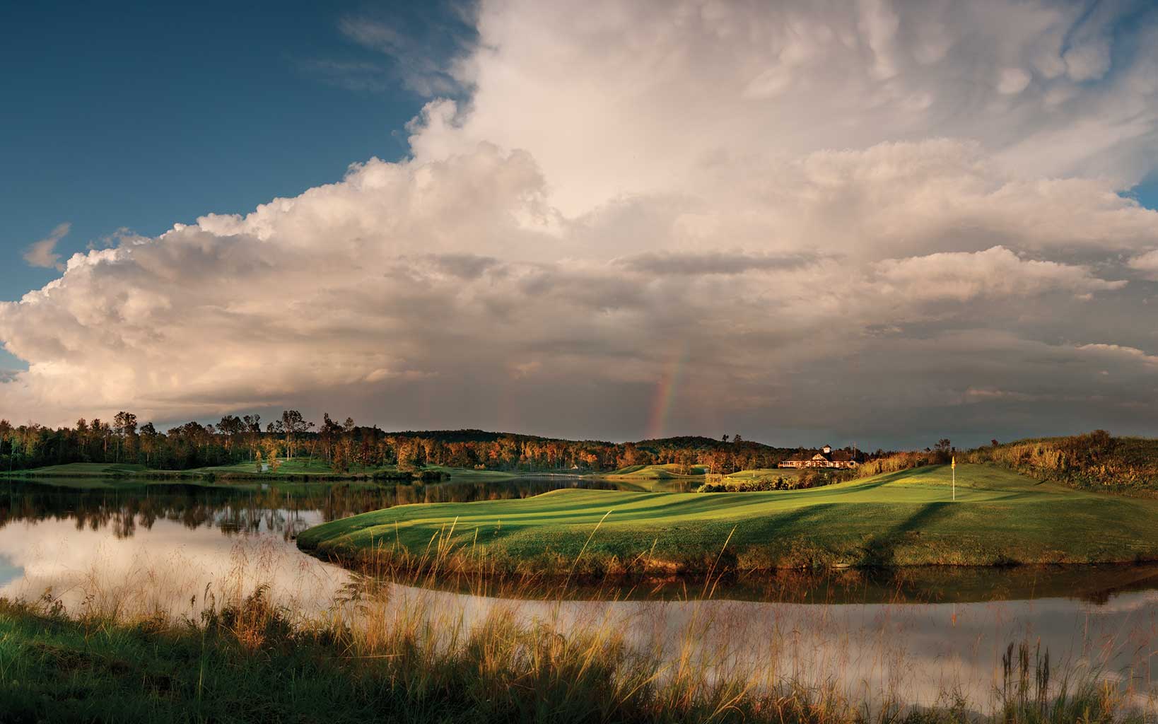 Large clouds billow over the seventh hole of the Short Course at Silver Lakes
