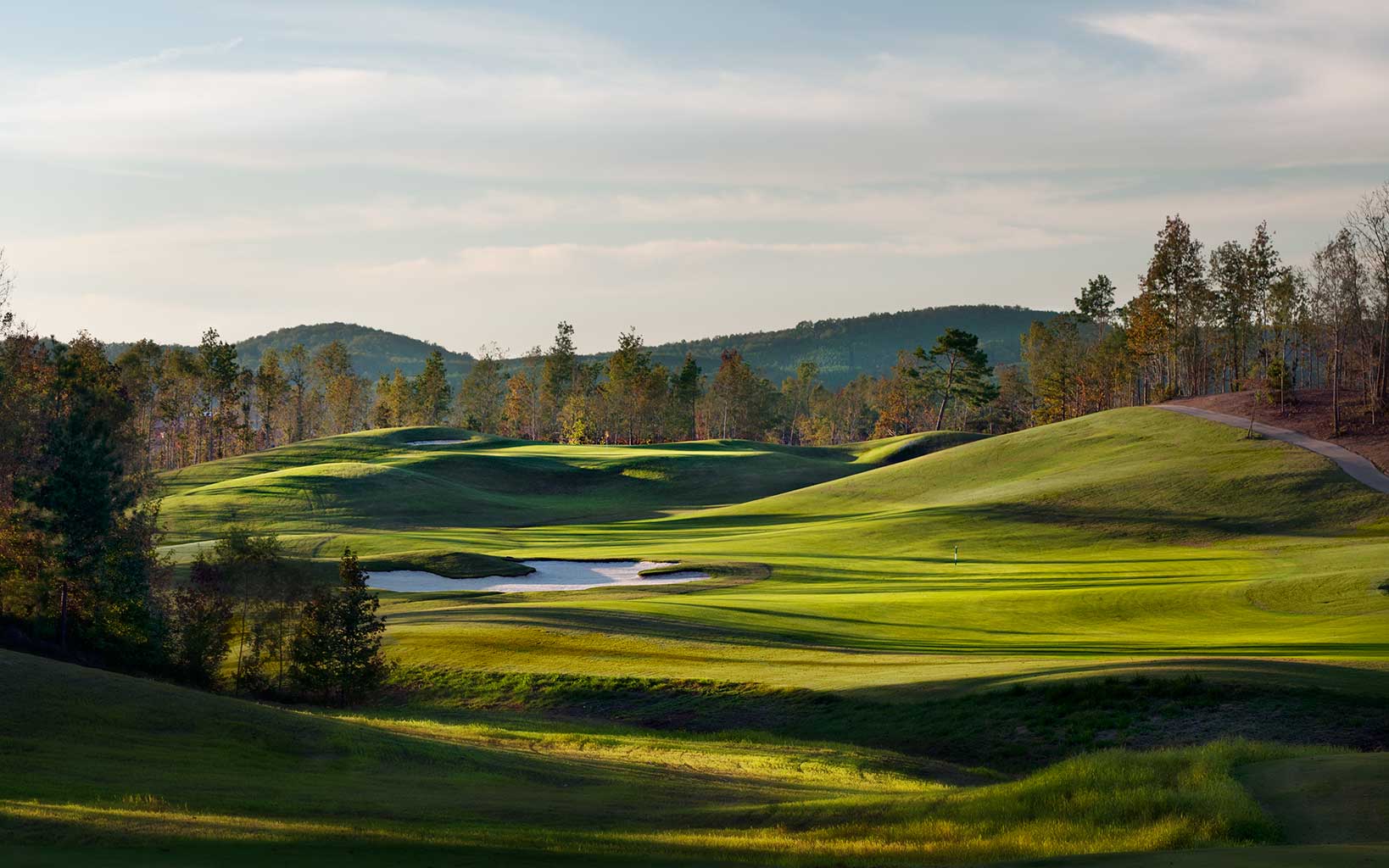 Lush green fairways feature at Silver Lakes Golf Course