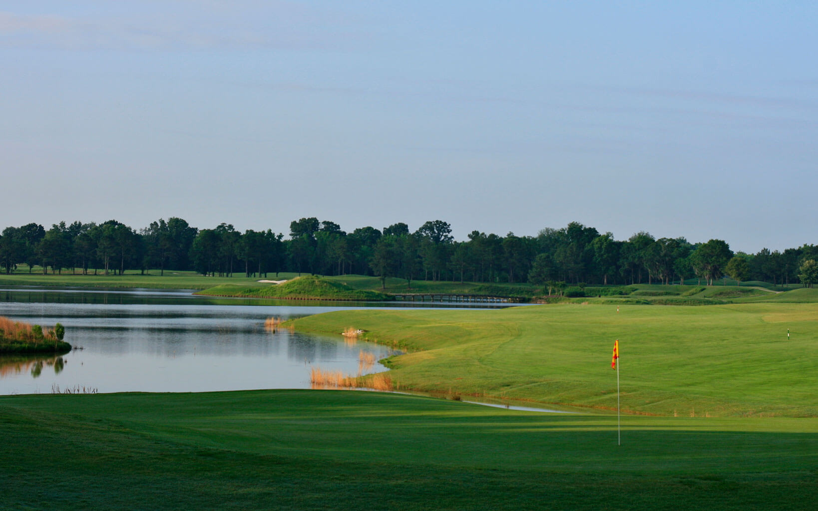 Landscape view of the seventh green and adjacent Alabama River