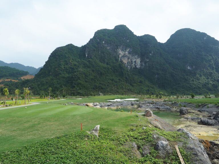 Large cliffs and mountains overlook the Stone Valley Golf Course