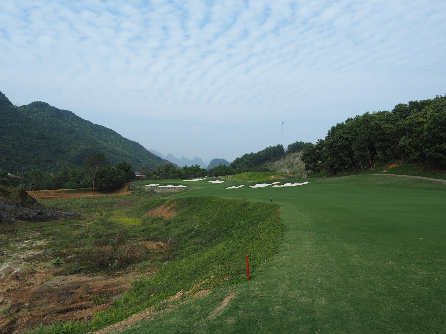 The eleventh fairway runs adjacent to a stream