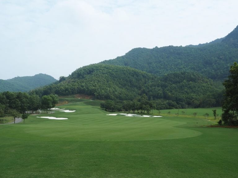 Lush vegetation surrounds the twelfth hole at Stone Valley