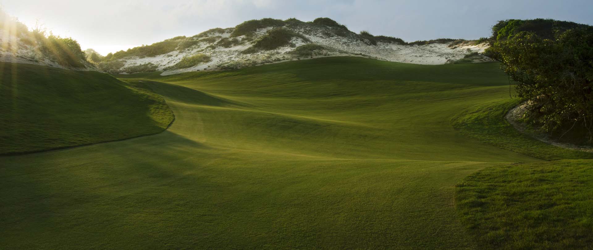 Towering sand dunes and massive elevation changes on the golf course
