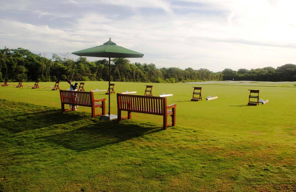 Seating area next to the golf practice driving range