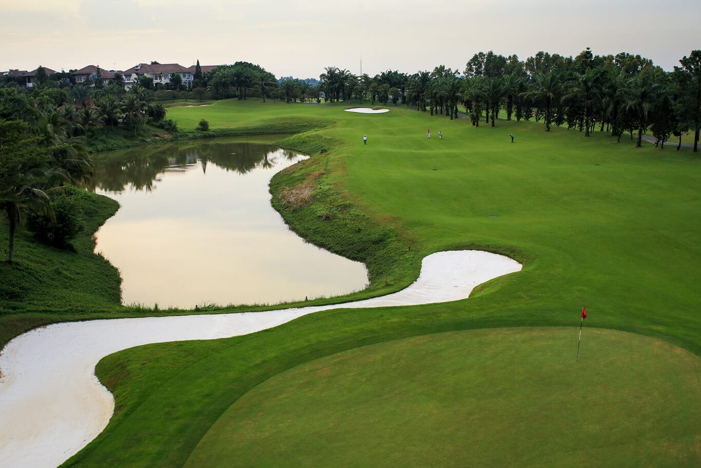 Players walk the course at Long Thanh Golf Club