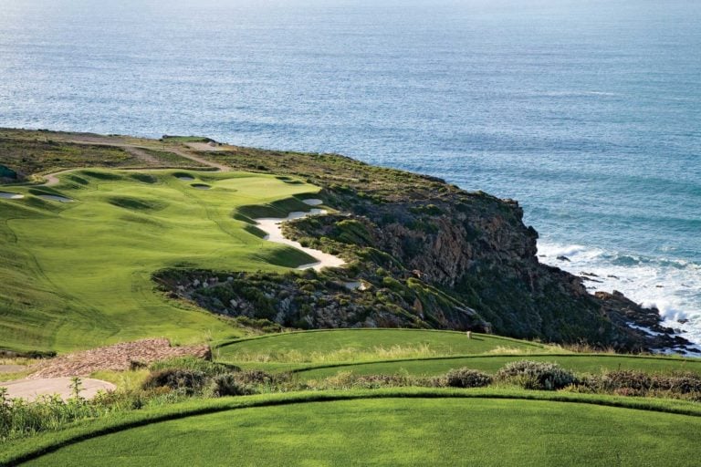 View over a golf hole from a tee at Pinnacle Point