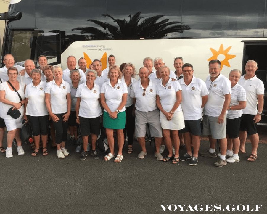 South African Golf Tour group standing in front of a bus with Voyages.golf superimposed