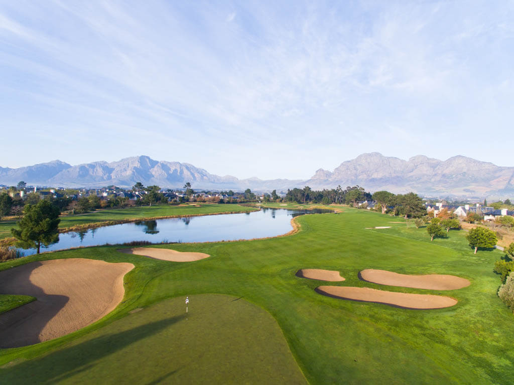 Aerial view of a lake and hole at Pearl Valley's golf course