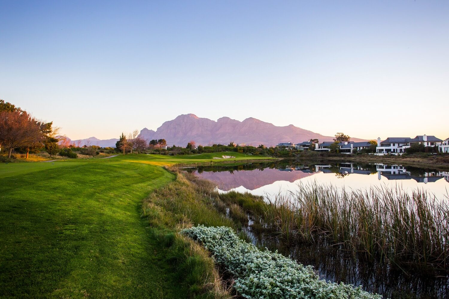 Mountain range rises over the back of Pearl Valley's golf course