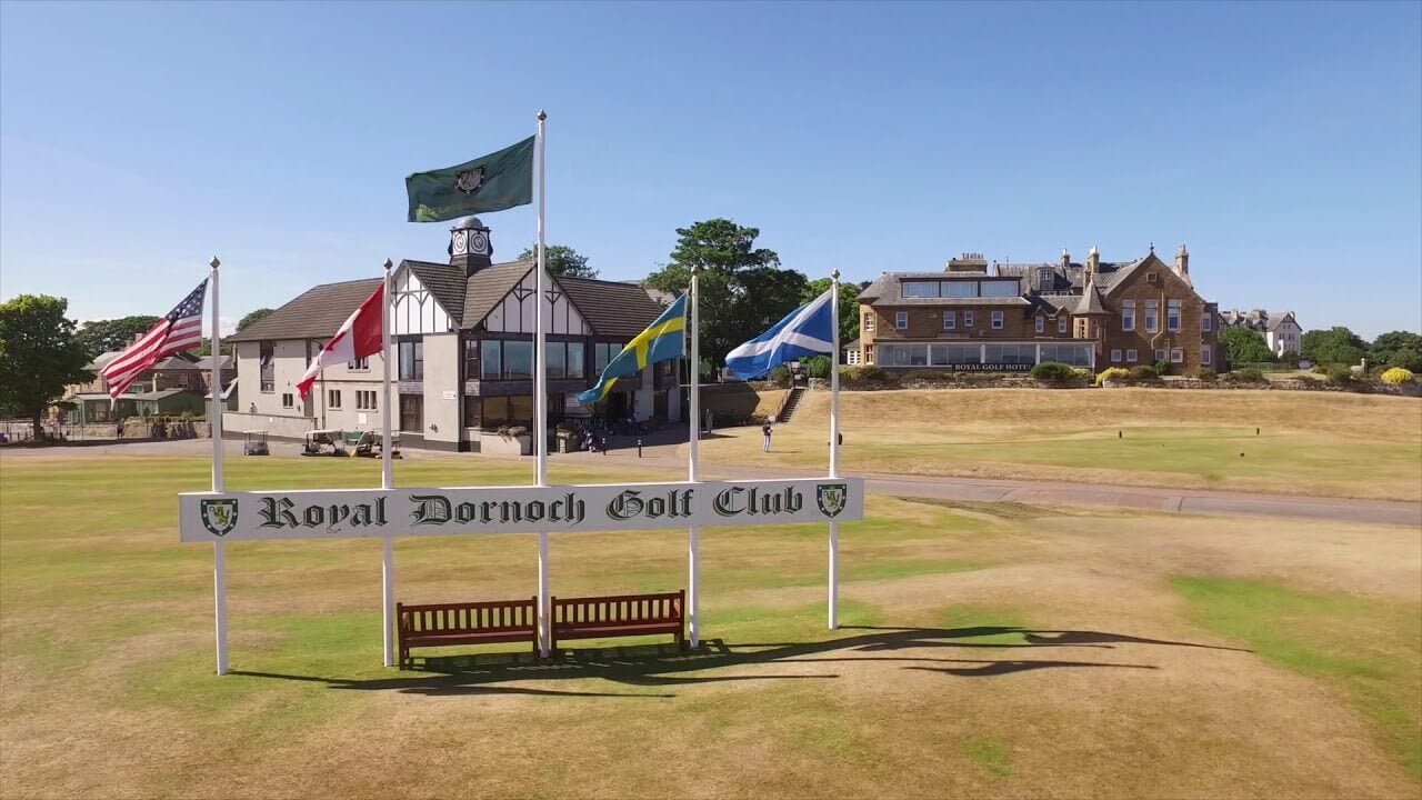 Flags stand showcasing the Royal Golf Hotel in Dornoch