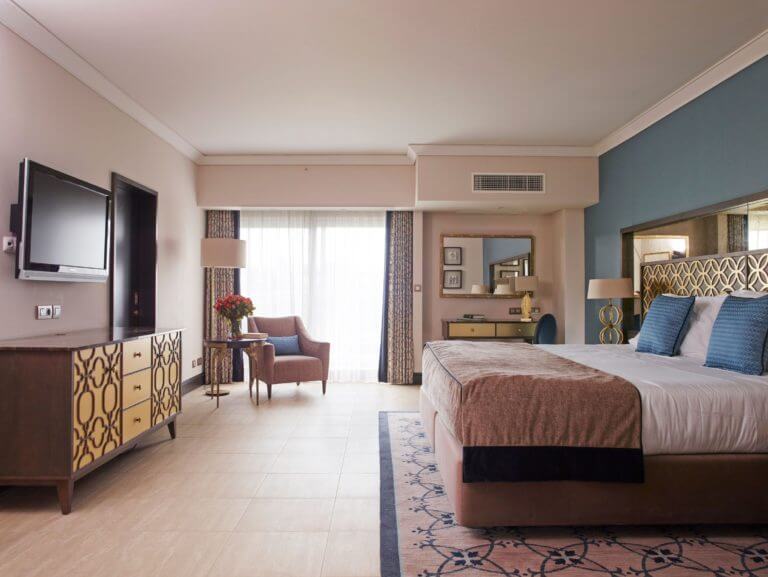 Interior king bedroom view at Dona Filipa hotel