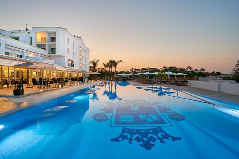 Twiliht view of the Dona Filipa Hotel pool
