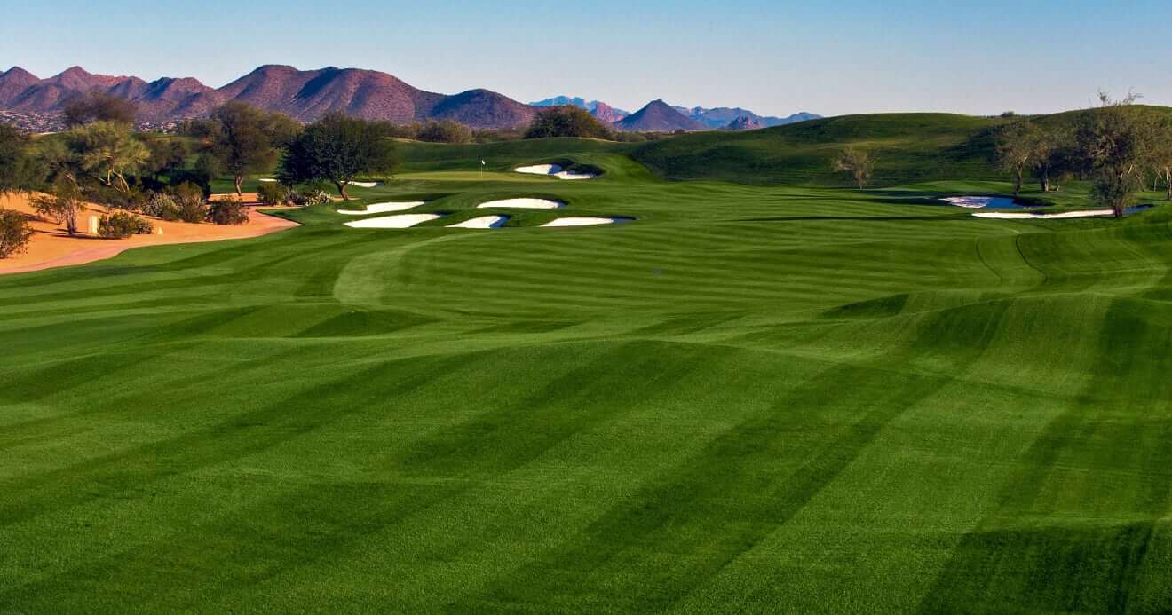 Sixth hole with panoramic mountain views