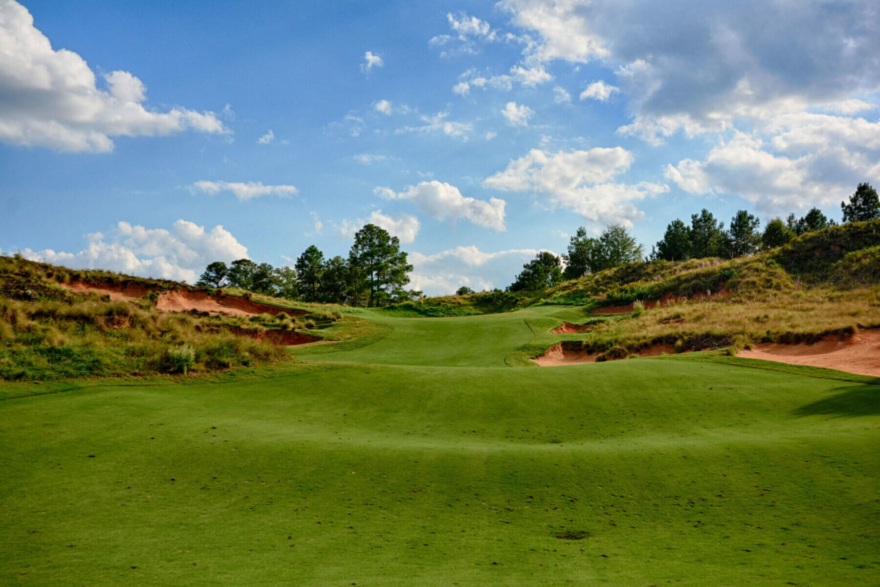 Rolling terrain on the 16th fairway