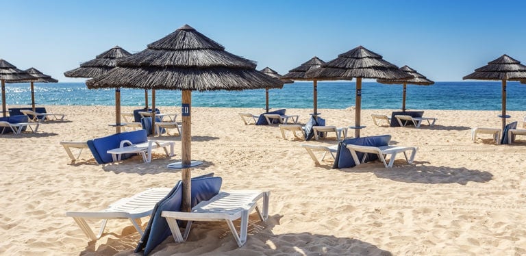 Private beach and recliners at Dom Pedro Resort Vilamoura