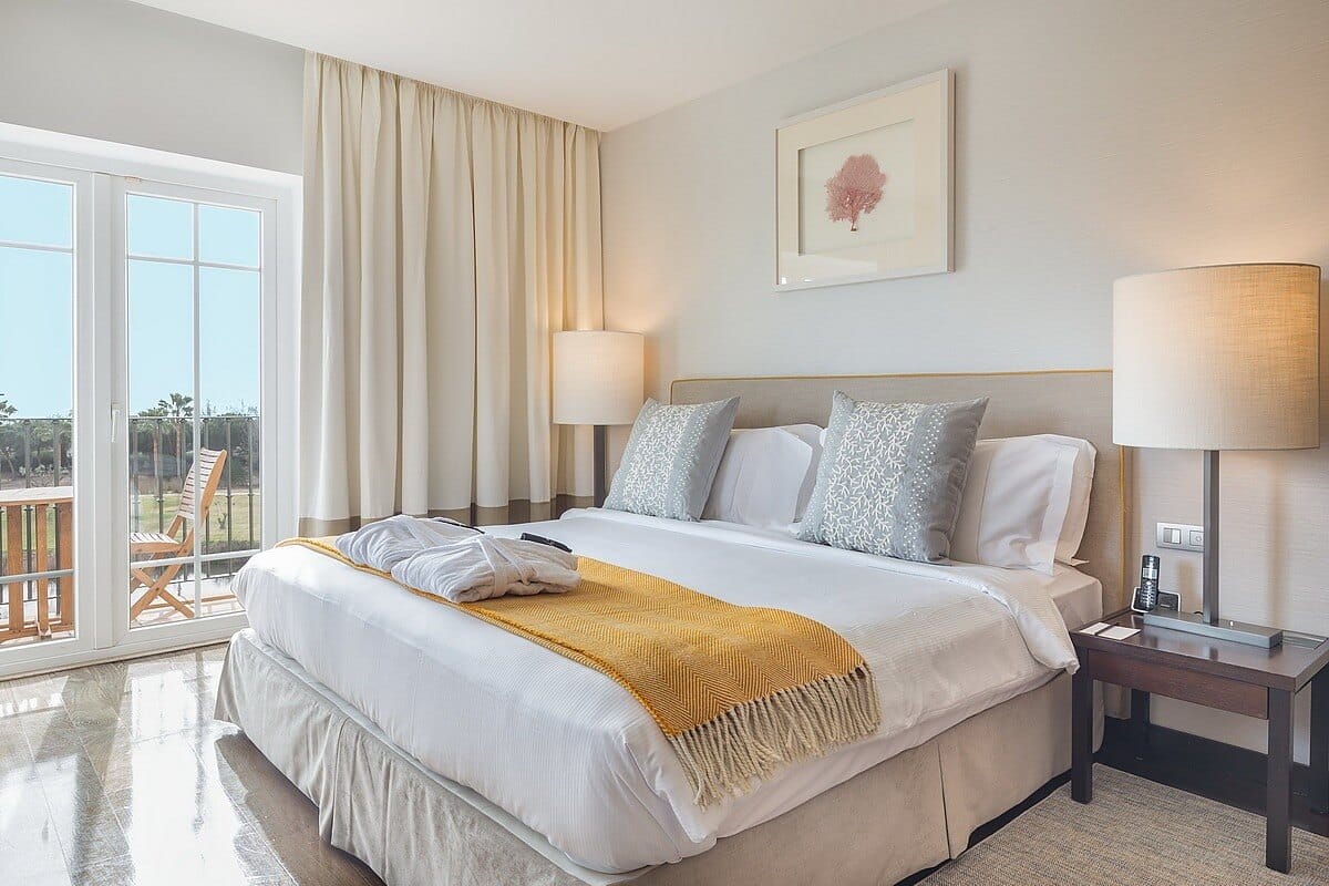 Large luxurious double bed awaits golfers