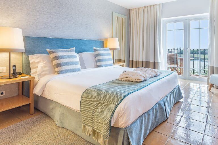 Spanish-tiled floor in luxury hotel bedroom