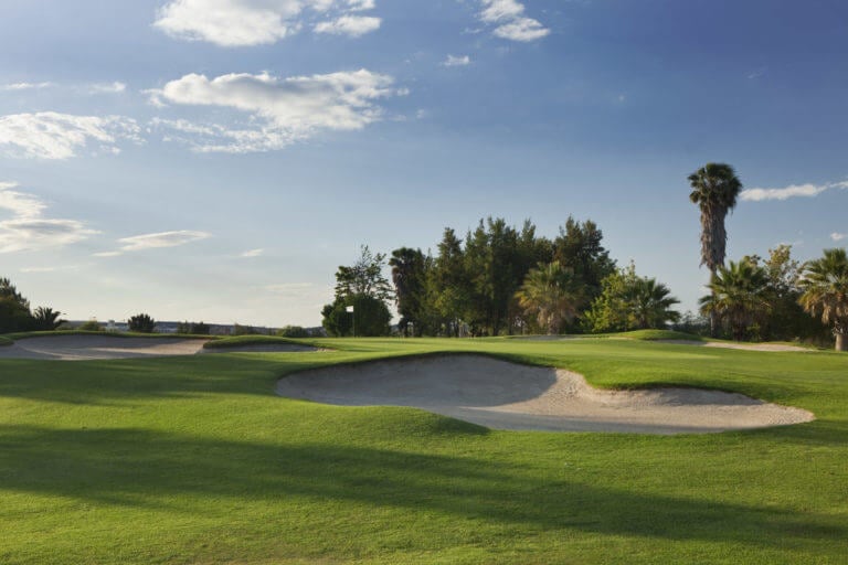 Large bunker protects raised green at Dom Pedro's Laguna golf course