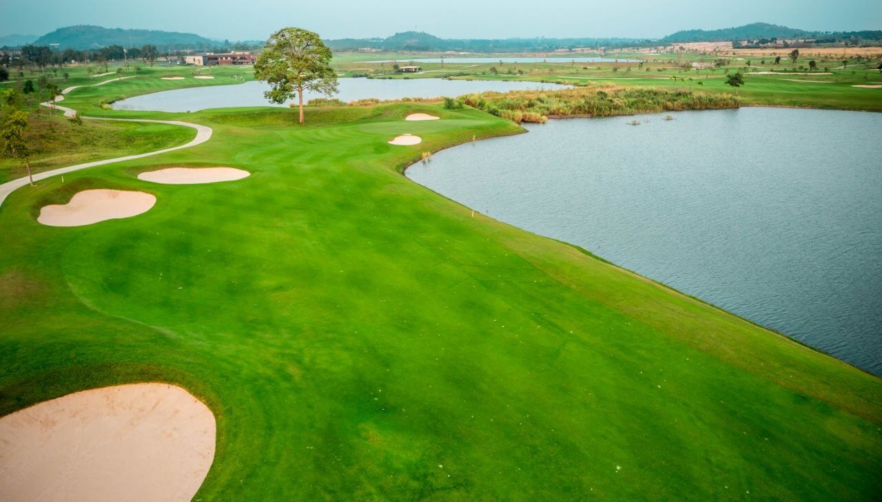 Fairway hugs a lake on the Waterside course