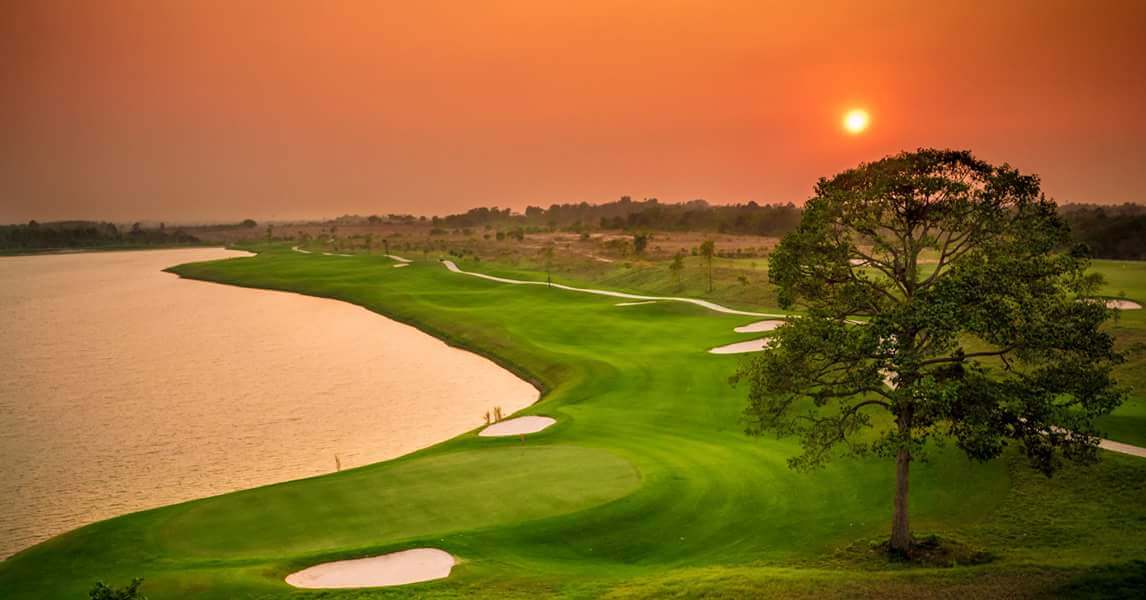 Orange sun casts golden light over Waterside course