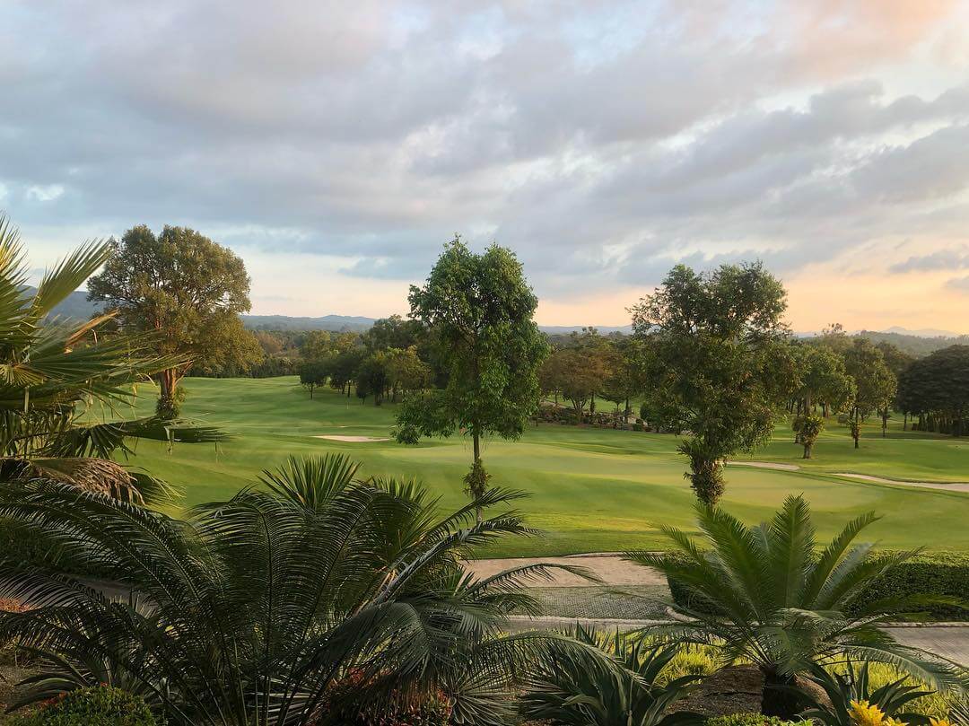 Sunset casts golden light over the Old Course