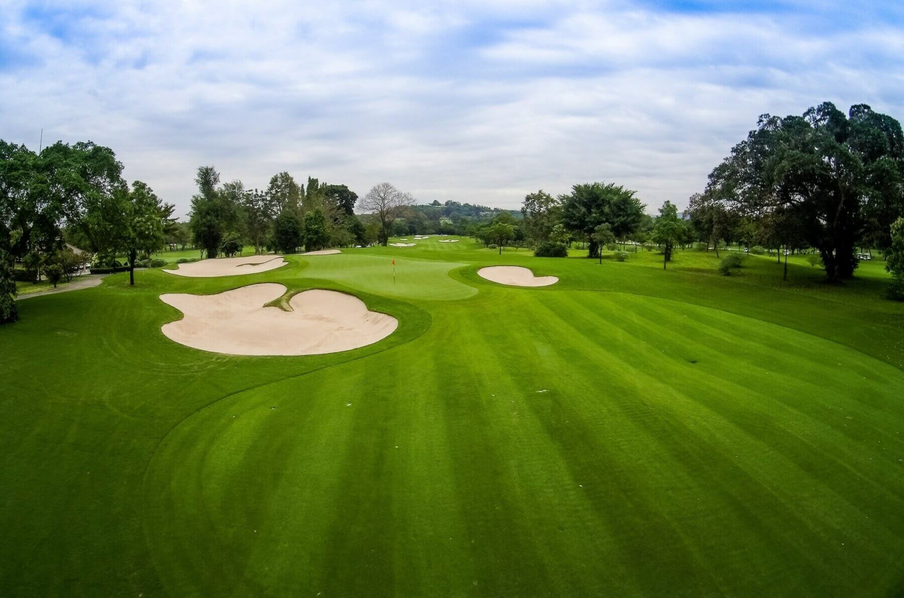 Aerial view over a fairway and green on the Old Course