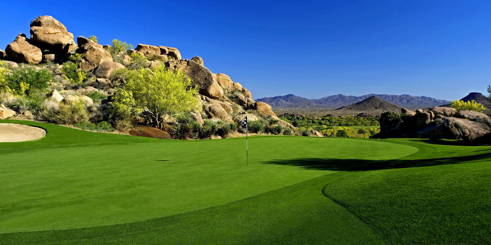 Large Boulders overlook Monument Course Fairway
