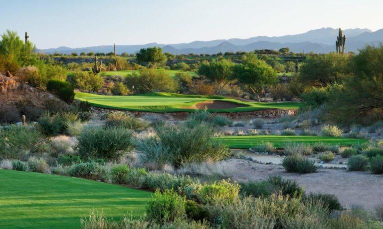 Waste fairway leads to protected green on Cholla Course