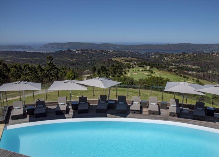 Outdoor pool with Knysna tonw views at Simola Resort