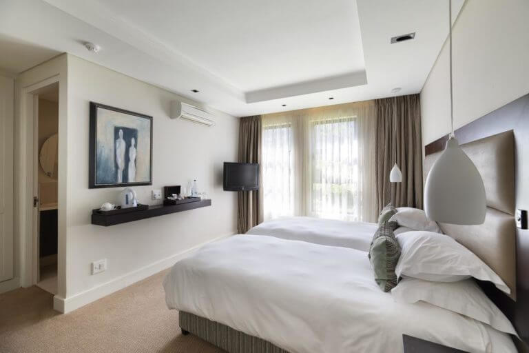 Twin bed room at Simola Estate Hotel